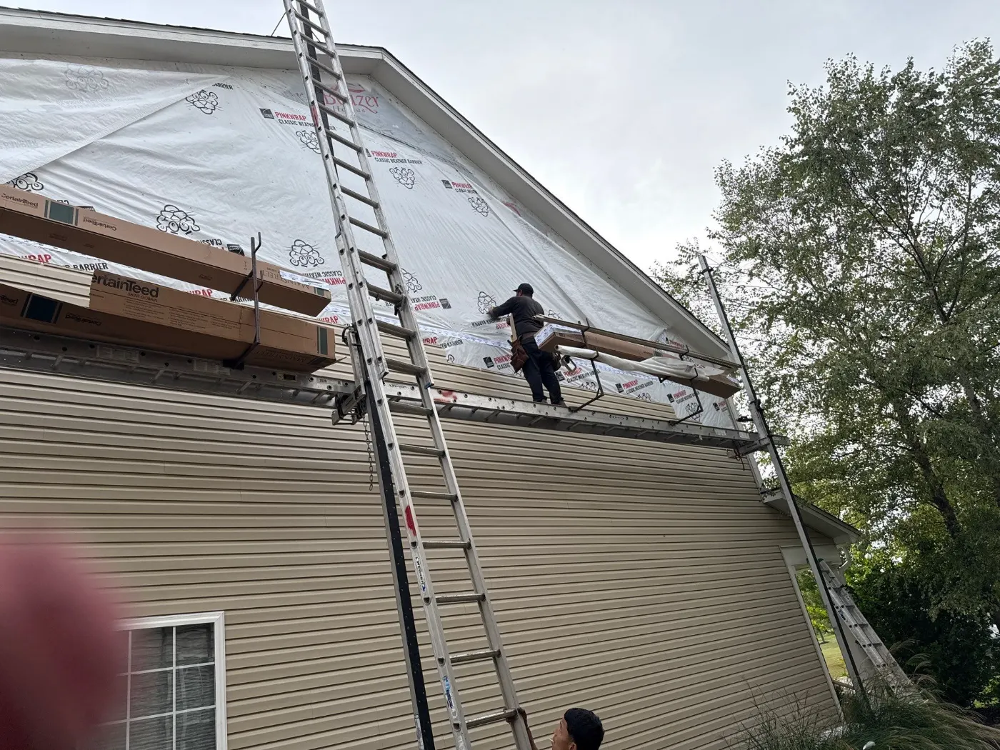 Siding installation documented in New Whiteland